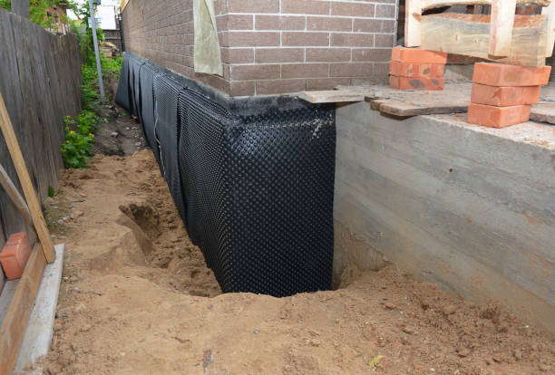 SJ Waterproofing Pros technician performing targeted Exterior Waterproofing assessment in Chattanooga, TN